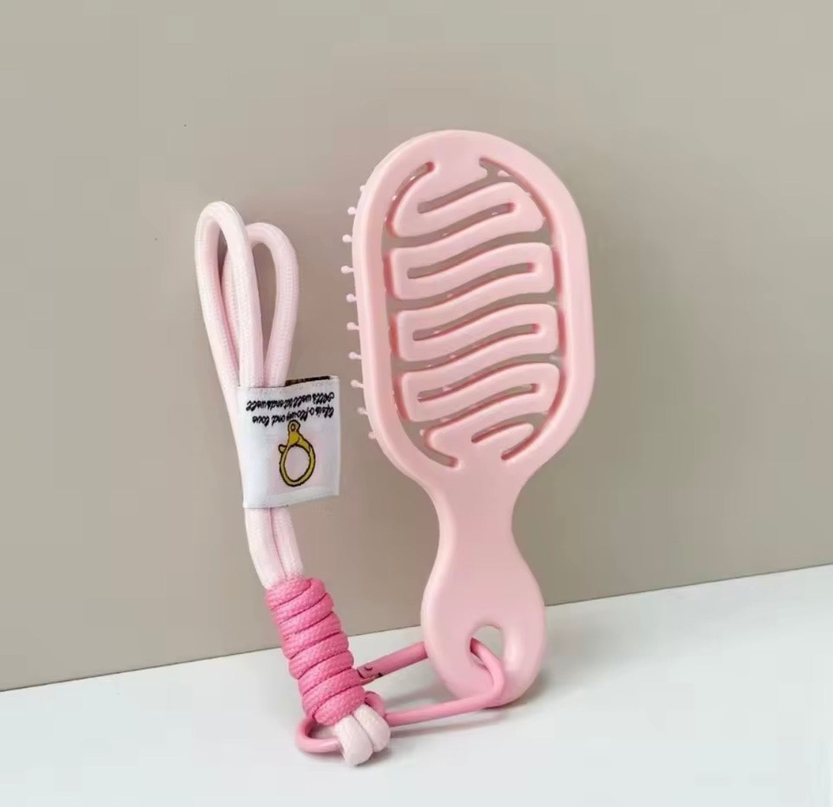 Porte clé Brosse Rose