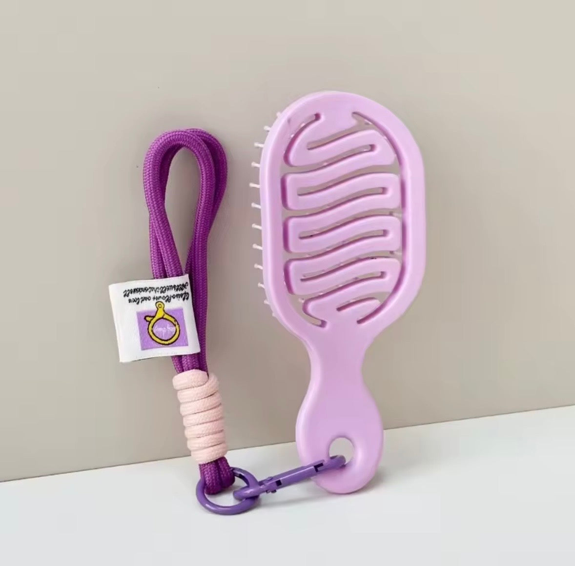 Porte clé Brosse Violette